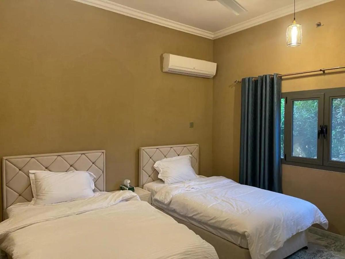 Rose Guesthouse Al 'Aqar ภายนอก รูปภาพ