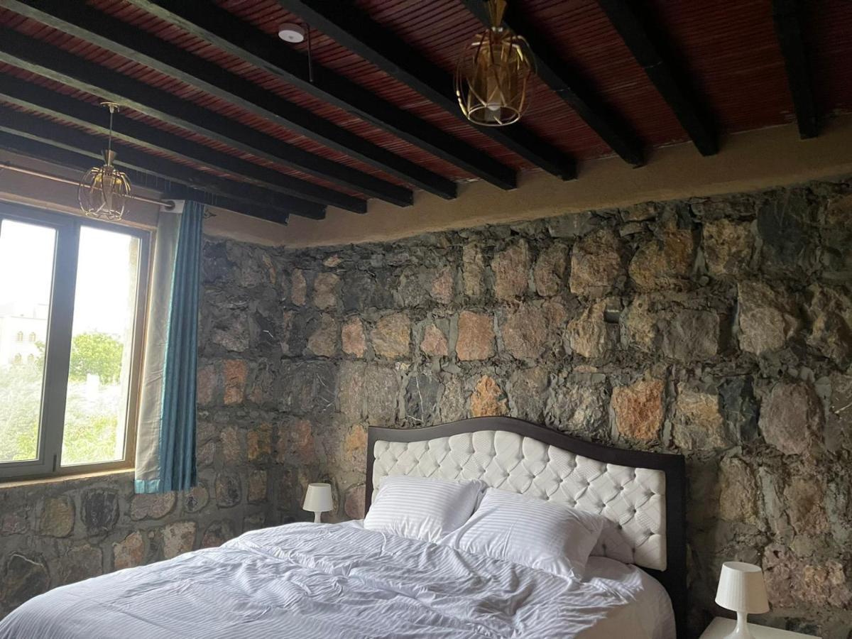Rose Guesthouse Al 'Aqar ภายนอก รูปภาพ